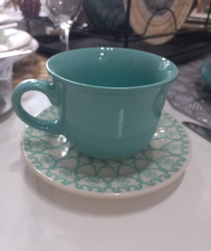Taza de té con plato mandala